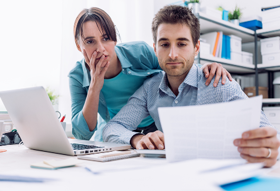 Couple looking at bills