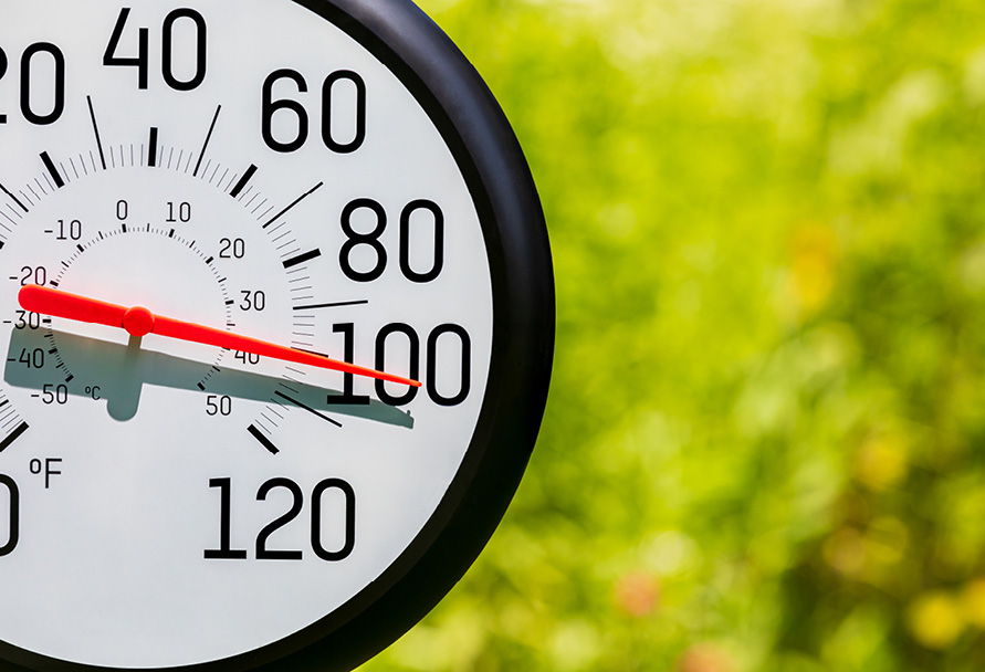 Outdoor thermometer showing above 100 degrees